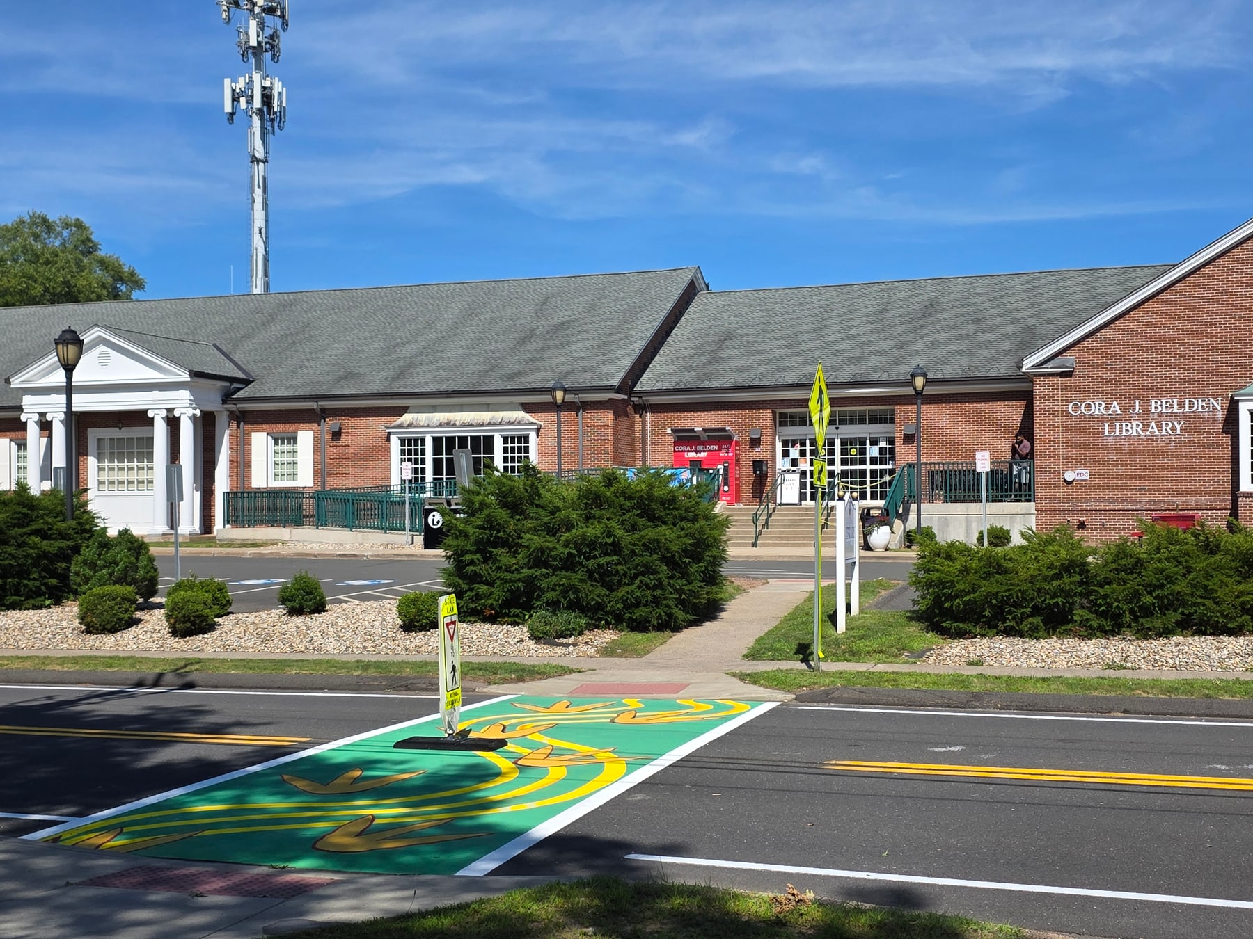 Green leaf crosswalk at Cora J. Belden Library in Rocky Hill